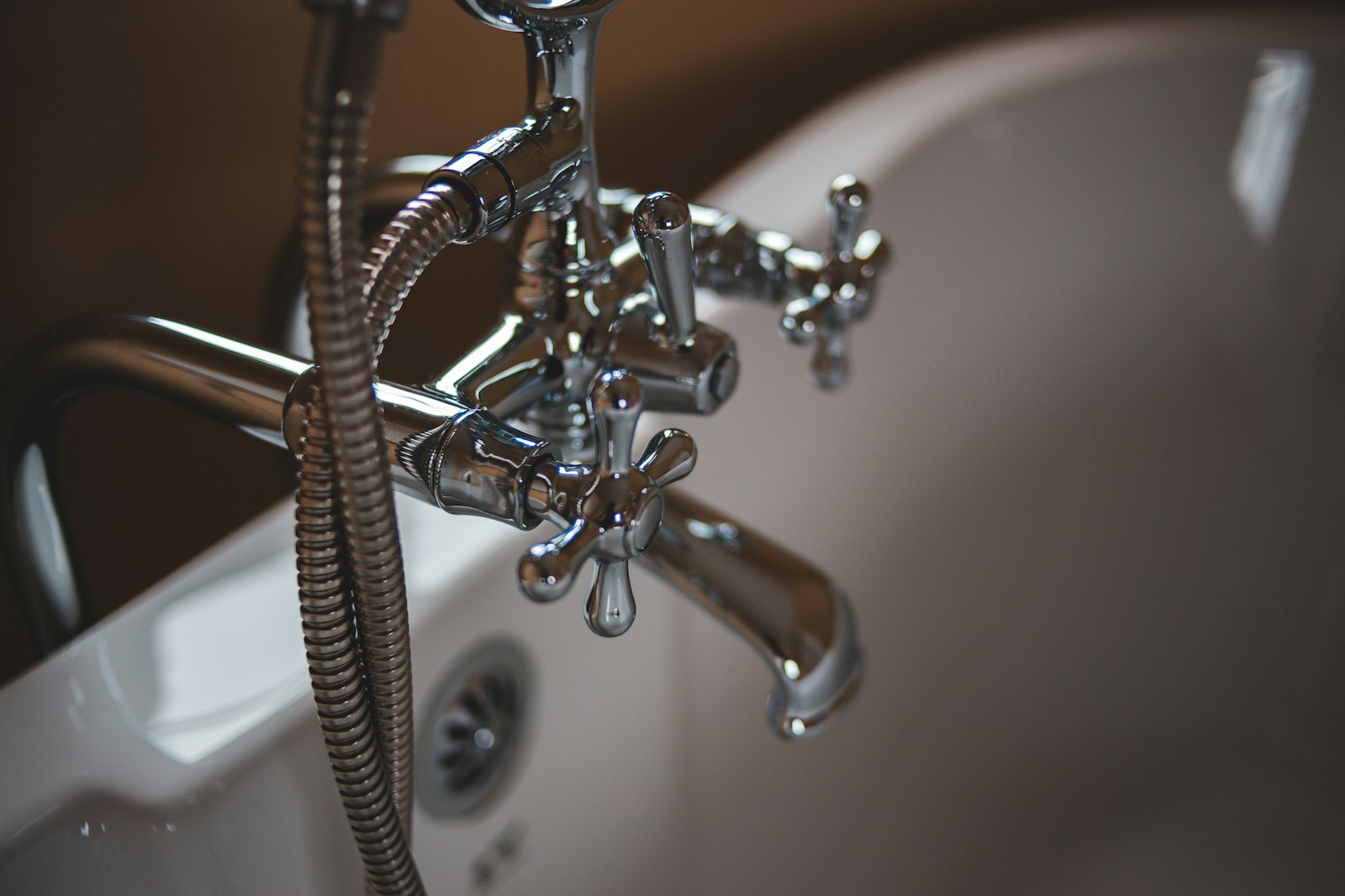 Restored clawfoot tub with polished chrome fittings